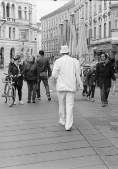 "Graz Street: Gentleman in White." - Camera: Zorki 1, Lense: Jupiter-8 2/50 , Film: Kodak Tri-X.