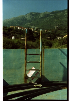 looking at things | abandoned. Camera: Zorki 1. Location: Budva, Montenegro.